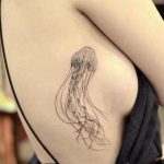 Jellyfish side boob tattoo