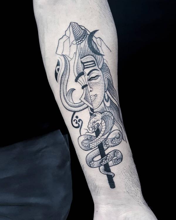 Lord Shiva with snake tattoo forearm