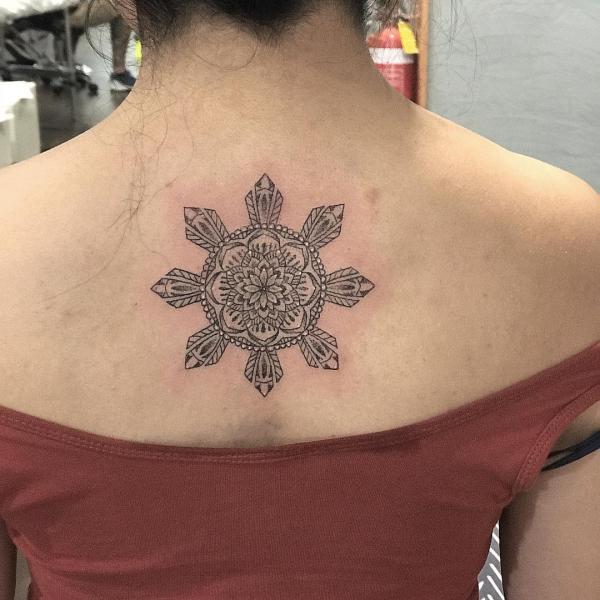 Mandala Filipino sun tattoo on upper back