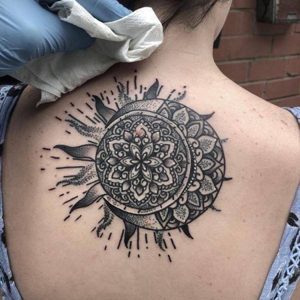 Mandala sun and moon back tattoo