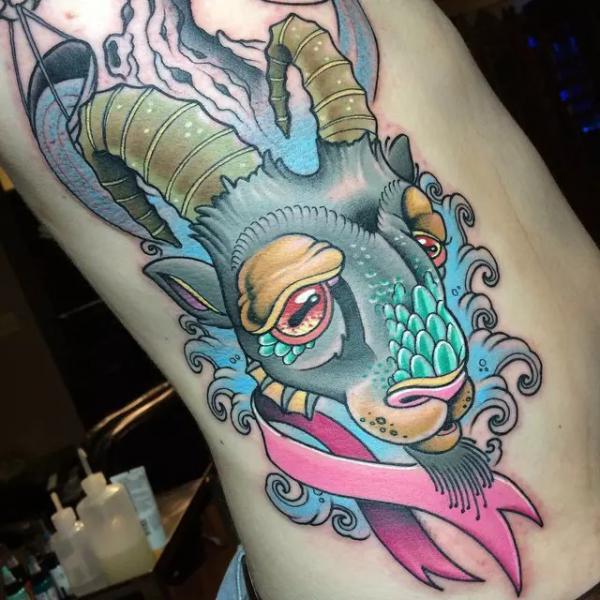 Neo traditional Capricorn sea goat tattoo