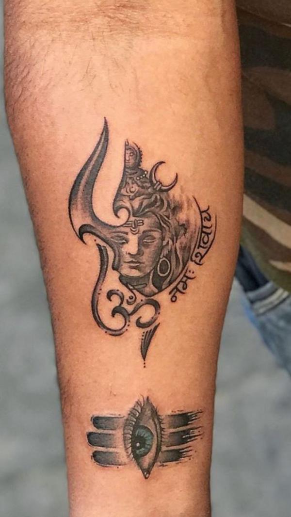 OM Shiva and third eye tattoo forearm