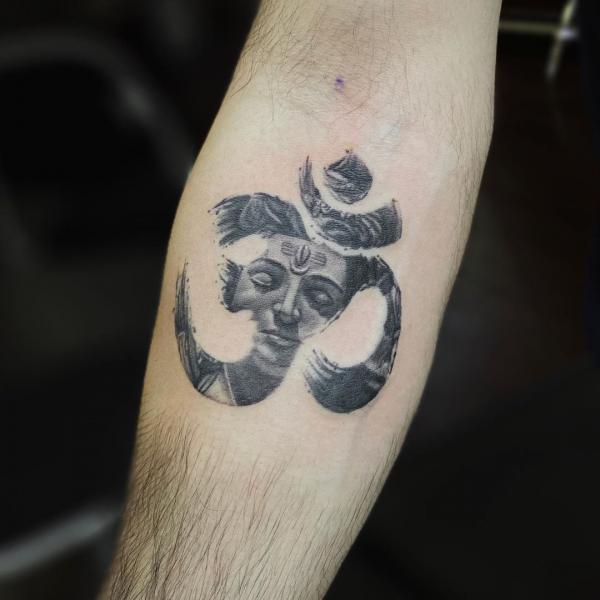 OM buddha tattoo black and grey