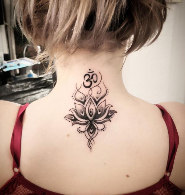Om and lotus tattoo nape