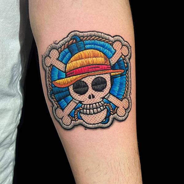 One piece skull patch tattoo