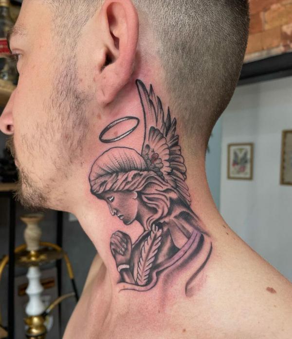 Praying Guardian angel neck tattoo