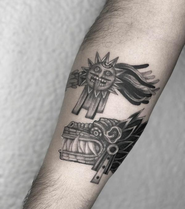 Quetzalcoatl and sun God tattoo