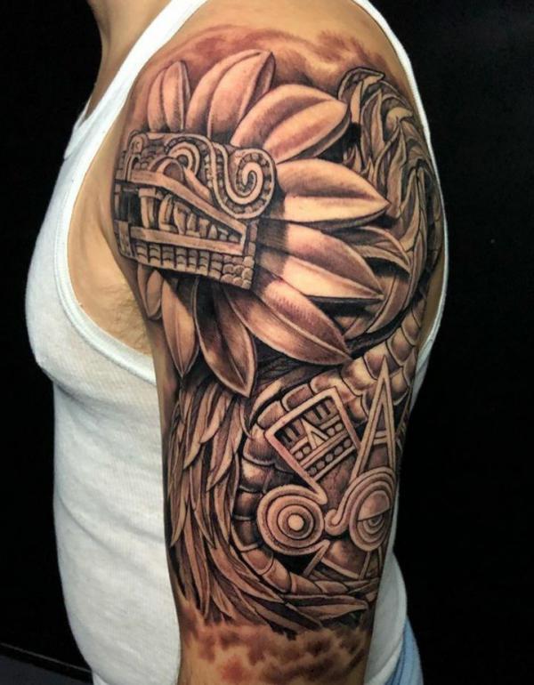 Quetzalcoatl half sleeve tattoo