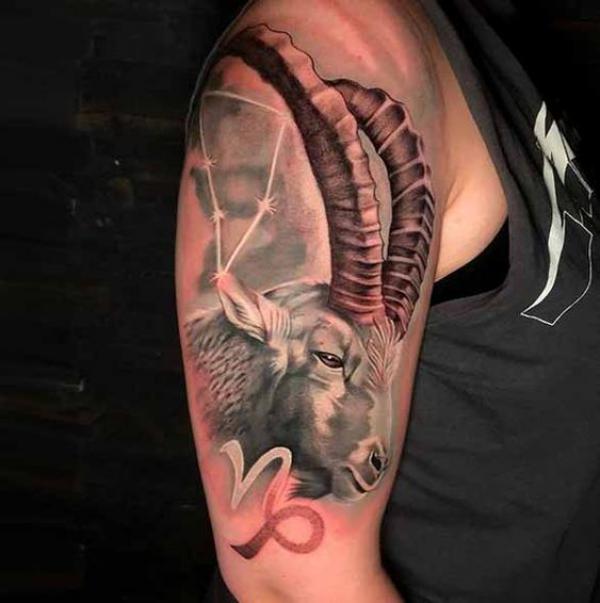 Realistic Capricorn goat and constellation tattoo half sleeve