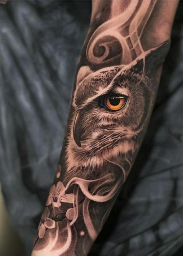 Realistic smoke and owl tattoo