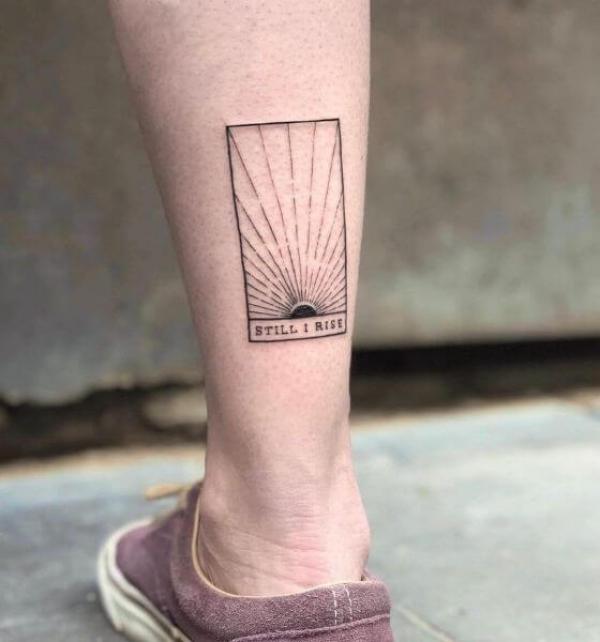 Rising sun card tattoo