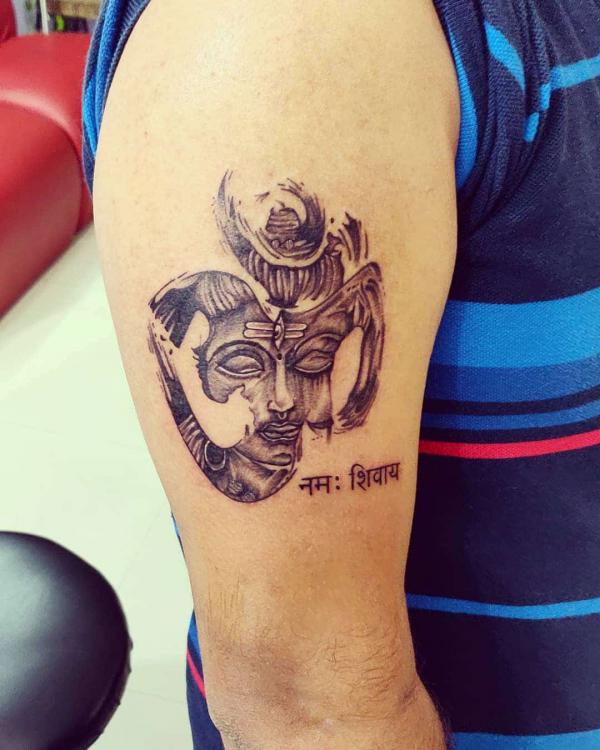 Shiva OM tattoo upper arm