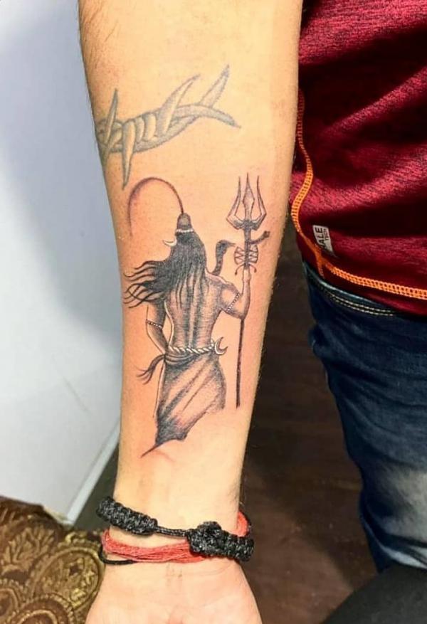 Shiva holding a trishul tattoo