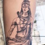 Shiva in meditation tattoo forearm