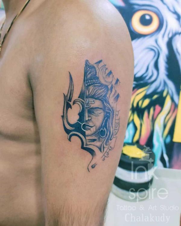 Shiva tattoo upper arm