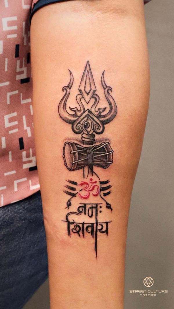 Shiva trishul with OM tattoo forearm