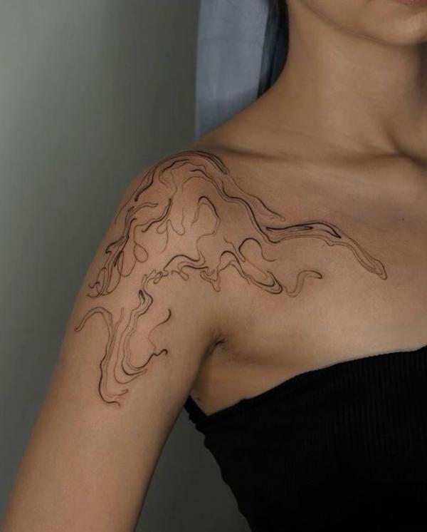 Shoulder smoke tattoo