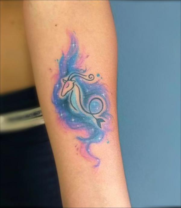 Simpe Capricorn sea goat on watercolor backdrop tattoo