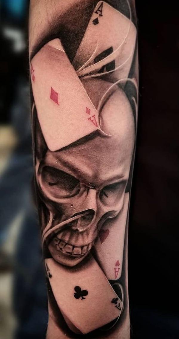 Skull with ace of spades tattoo