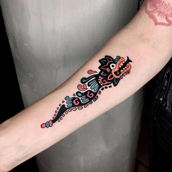 Small traditional Quetzalcoatl tattoo forearm