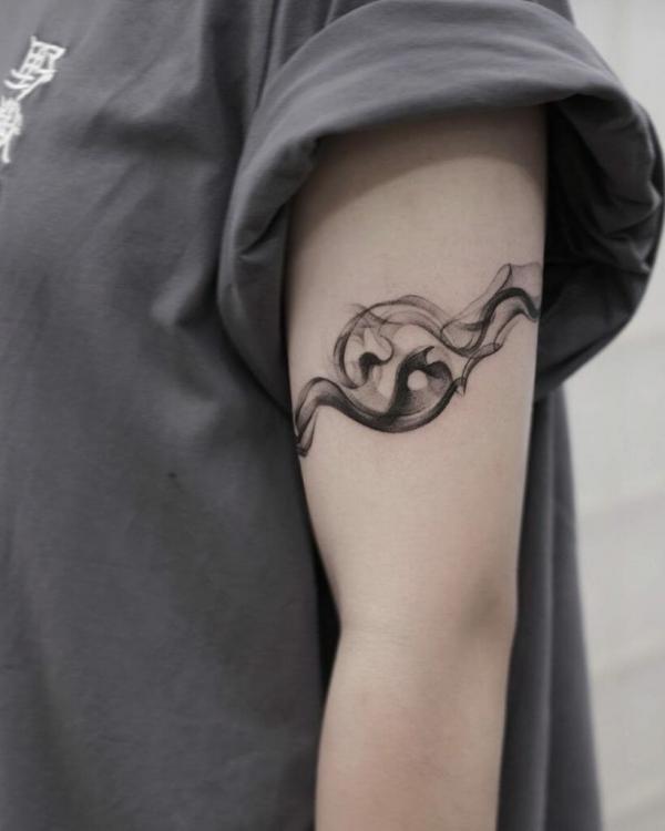 Smoke Yin Yang tattoo