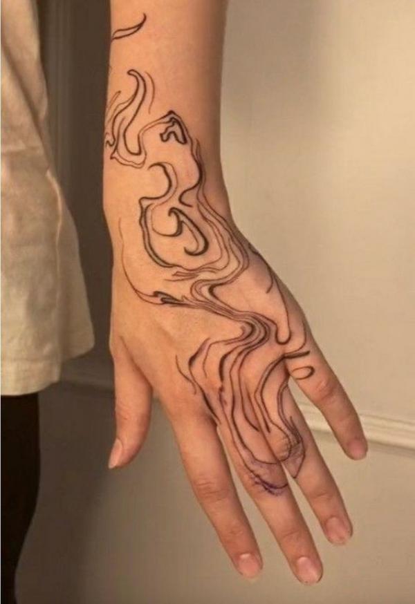 Smoke hand tattoo