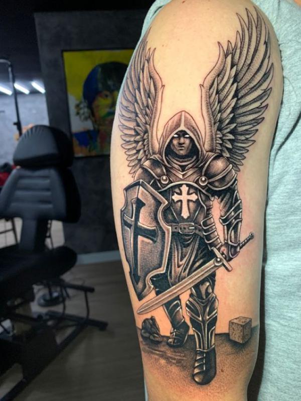 St Michael with sword and shield tattoo half sleeve