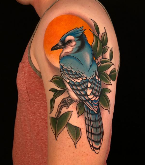Sun and blue jay tattoo half sleeve