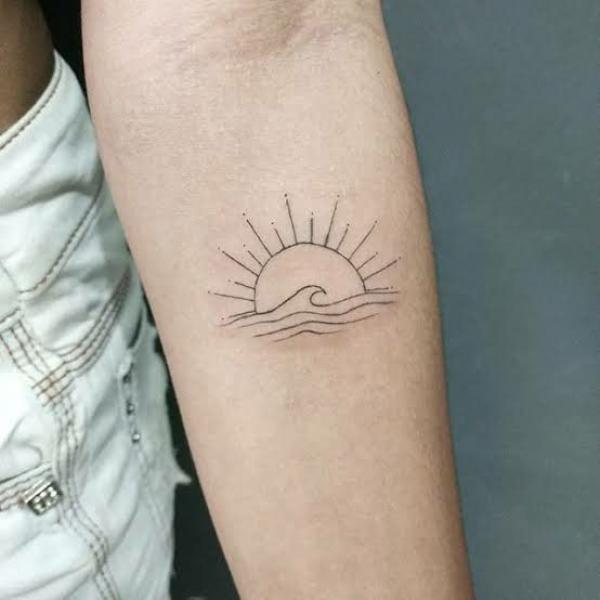 Sun and wave line work tattoo