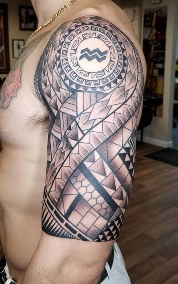 Tribal pattern with Aquarius glyph tattoo half sleeve