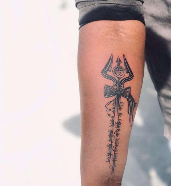 Trishul with mantra tattoo