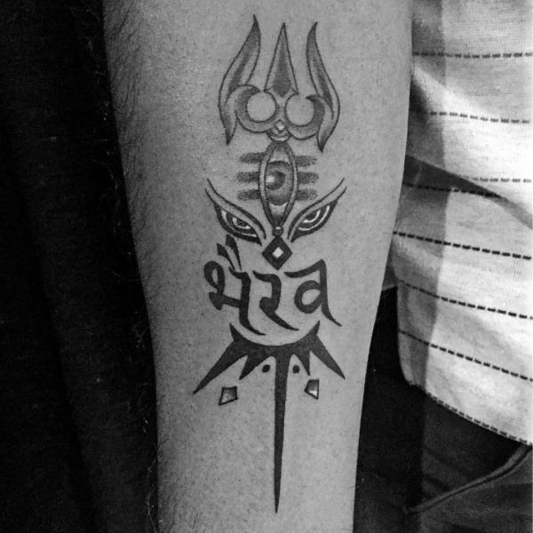 Trishul with the third eye tattoo forearm