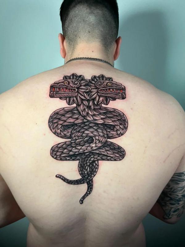 Two quetzalcoatl interwined tattoo