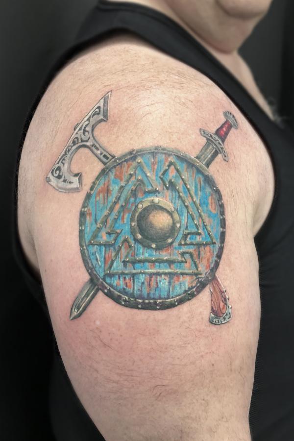Viking valknut shield with sword and axe tattoo