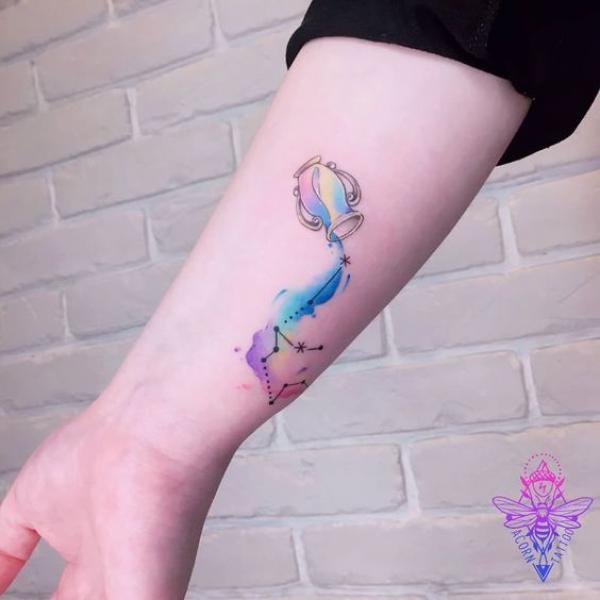 Watercolor Aquarius water bearer and constellation tattoo
