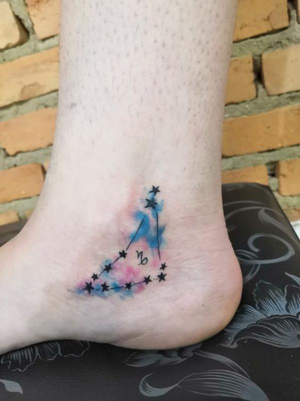 Watercolor Capricorn constellation ankle tattoo