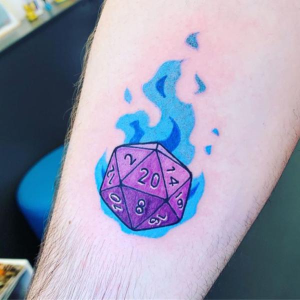 Watercolor D20 dice tattoo