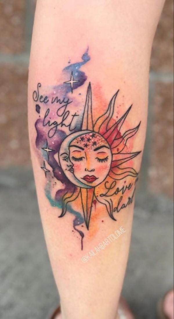Watercolor sun and moon tattoo