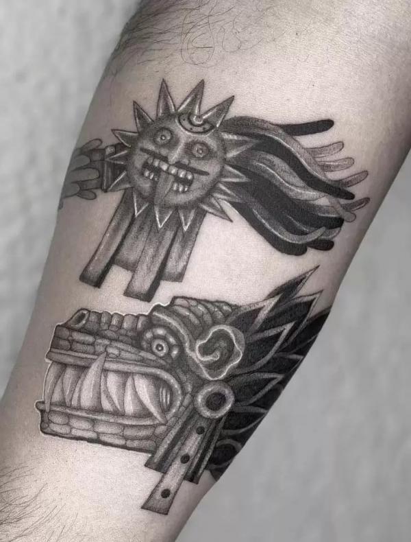 aztec sun and dragon tattoo