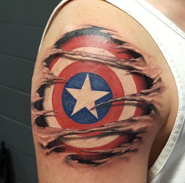 captain america shield ripped skin tattoo