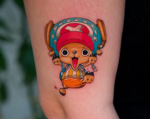 chopper tattoo upper arm