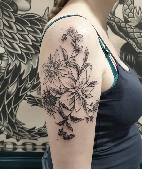 edelweiss tattoo upper arm
