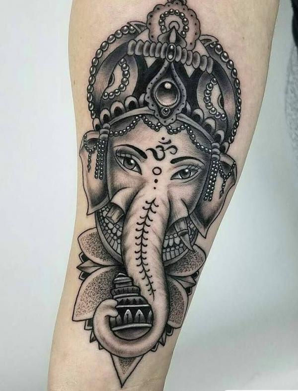 elephant OM tattoo