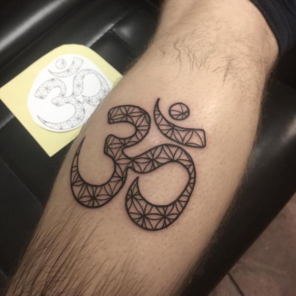 fine line flower om tattoo