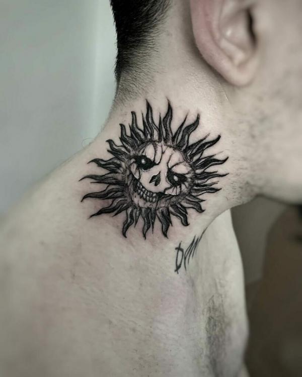 gothic sun tattoo neck