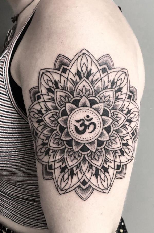 mandala flower om tattoo upper arm