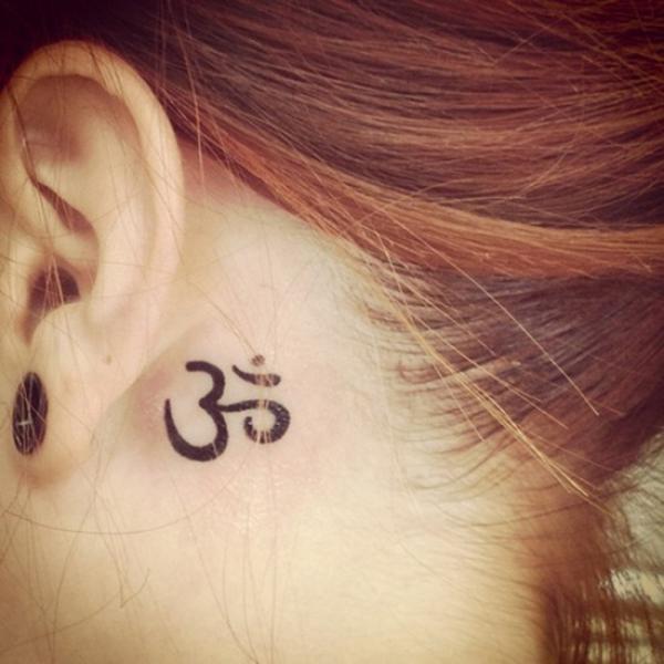om tattoo behind ear