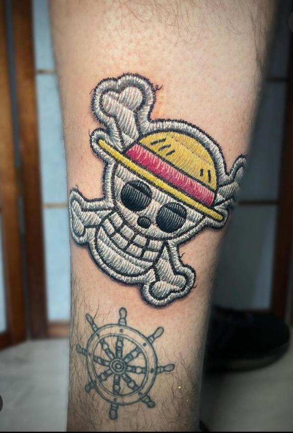 75 Striking One Piece Tattoos for Your Next Adventure | Art and Design