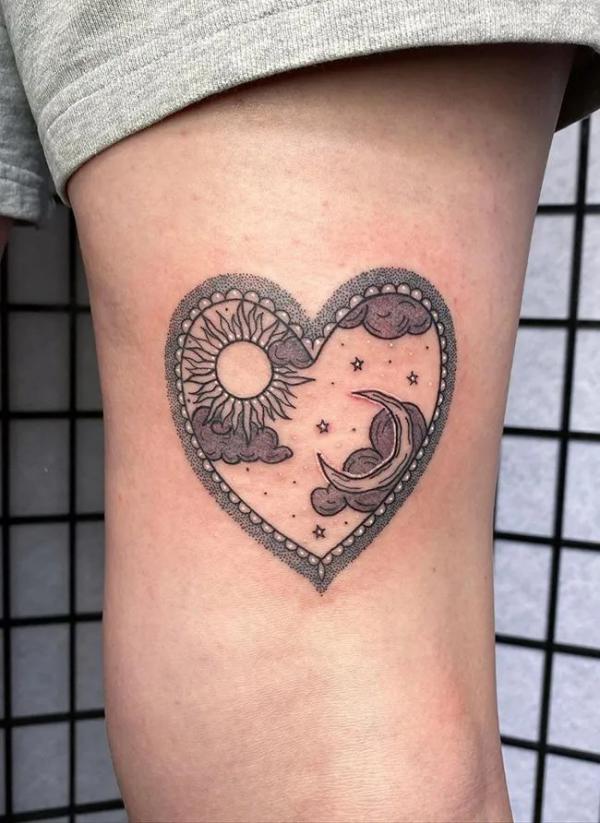 sun and moon in heart tattoo