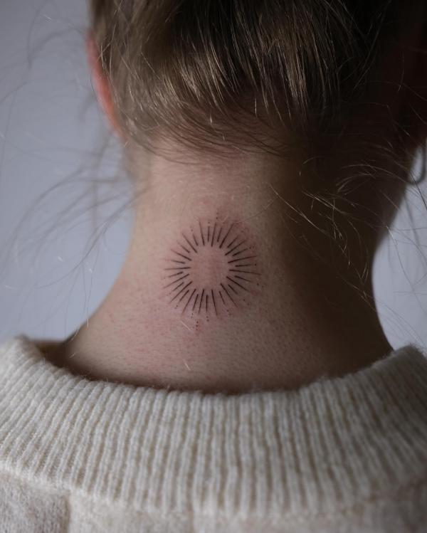 sunburst neck tattoo